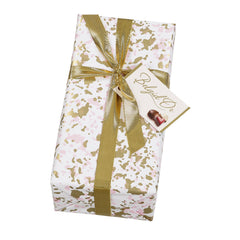 Splatter design gift wrapped ballotin of assorted Belgian chocolates