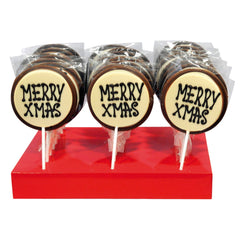Hand decorated milk chocolate Merry Xmas lollies