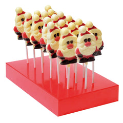 Hand decorated solid white chocolate santa lollies