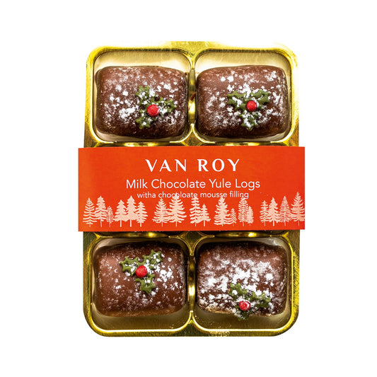 Milk chocolate Yule logs with a chocolate mousse filling in cello pack