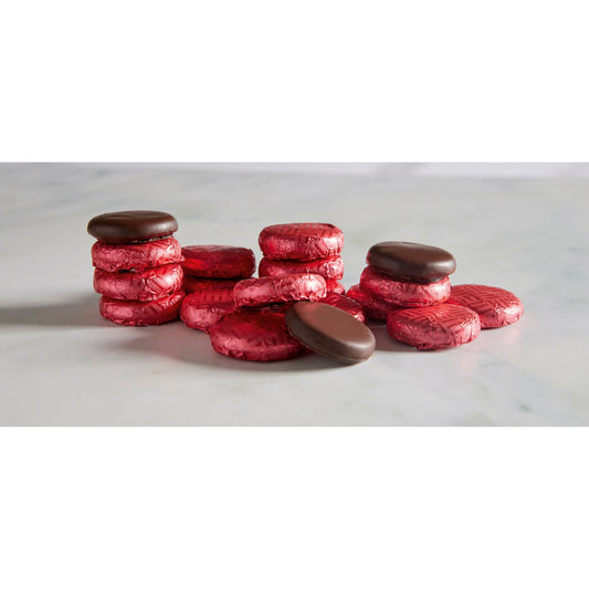 Raspberry crème - dark chocolate covered fondant in magenta coloured foil 120pcs