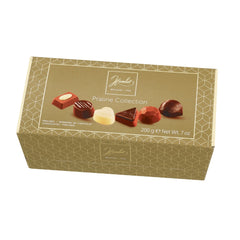 Jag Couture London - New York Hamlet Praline Collection gold ballotin of assorted chocolates