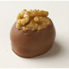 Jag Couture London - New York Manon Lait - light hazelnut caramel mousse on a croquant base hand decorated with a walnut 19g