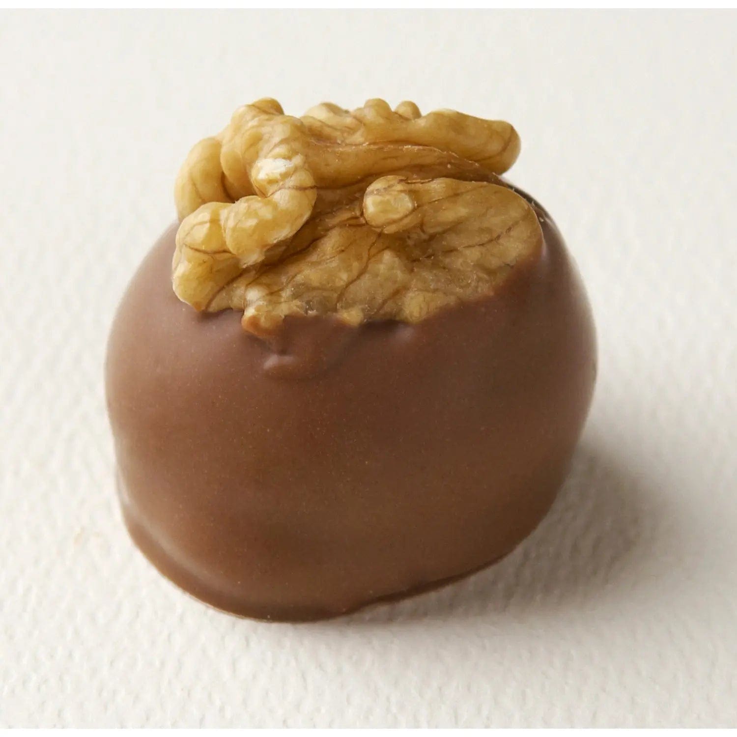 Jag Couture London - New York Manon Lait - light hazelnut caramel mousse on a croquant base hand decorated with a walnut 19g