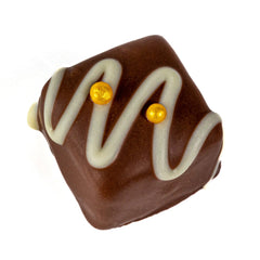 Jag Couture London - New York Vine Fruits - rum & raisin fudge in milk chocolate with white stripe and gold balls 19g
